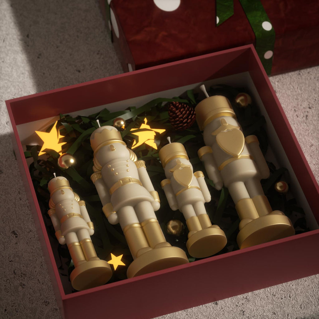 Boxed set of gold-accented nutcracker candles in various sizes—perfect for festive gifting and Christmas displays - Boowan Nicole