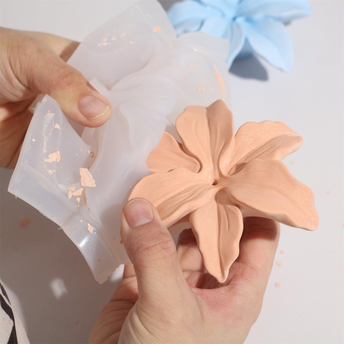 Unmold the red clay colored lily bulbs from the silicone molds-Boowan Nicole