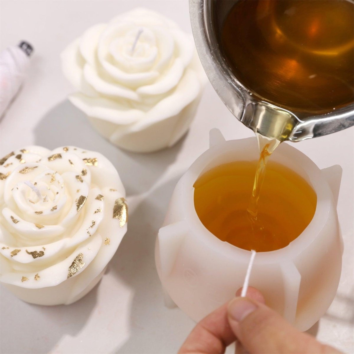 Pouring Wax into Medium-Sized Silicone Rose Candle Mold - Boowan Nicole