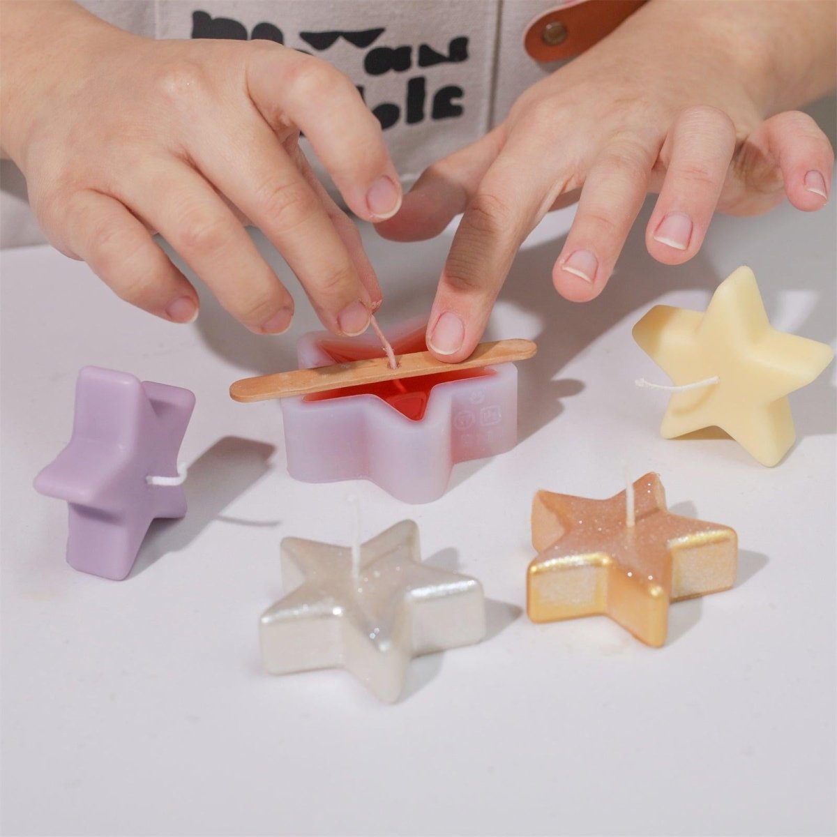 Fix Candle Wicks with Popsicle Sticks-Boowan Nicole