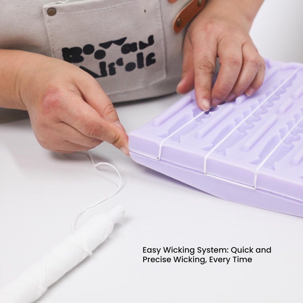 Secure the candle wick into the wick slot for quick and precise wicking every time- Boowan Nicole