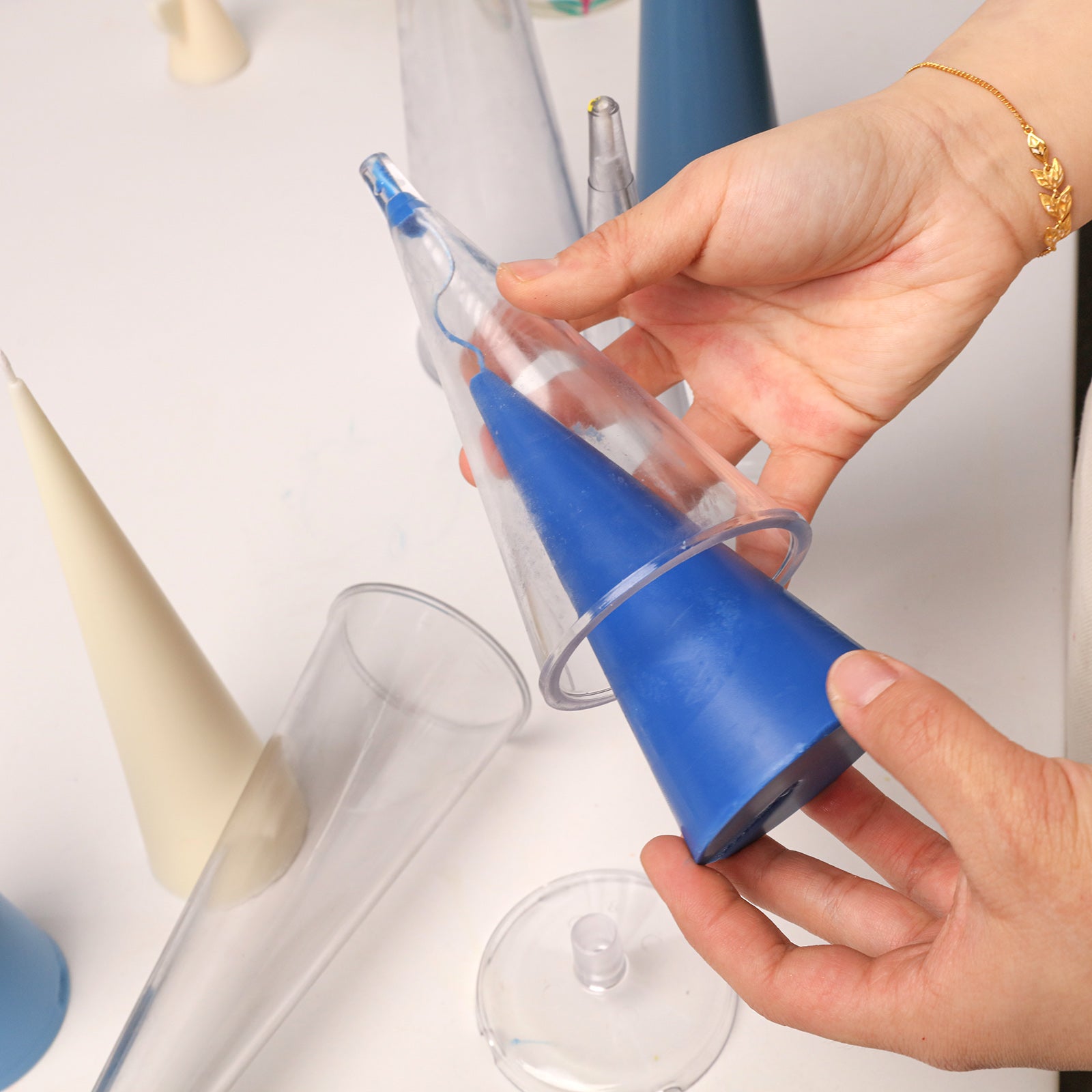 Demolding Blue Conical Candle from Mold - Boowan Nicole