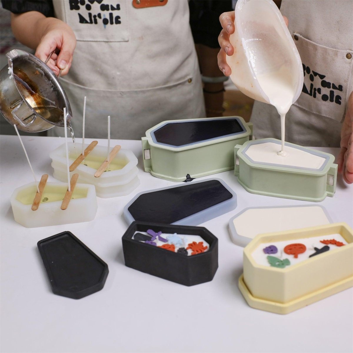 Pouring prepared materials into silicone molds - Boowan Nicole