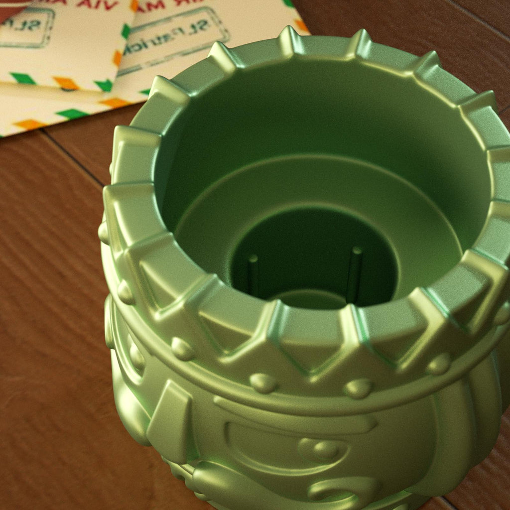 Close-up of a green nutcracker candle holder mold with dual candle slots for taper and tealight compatibility - Boowan Nicole