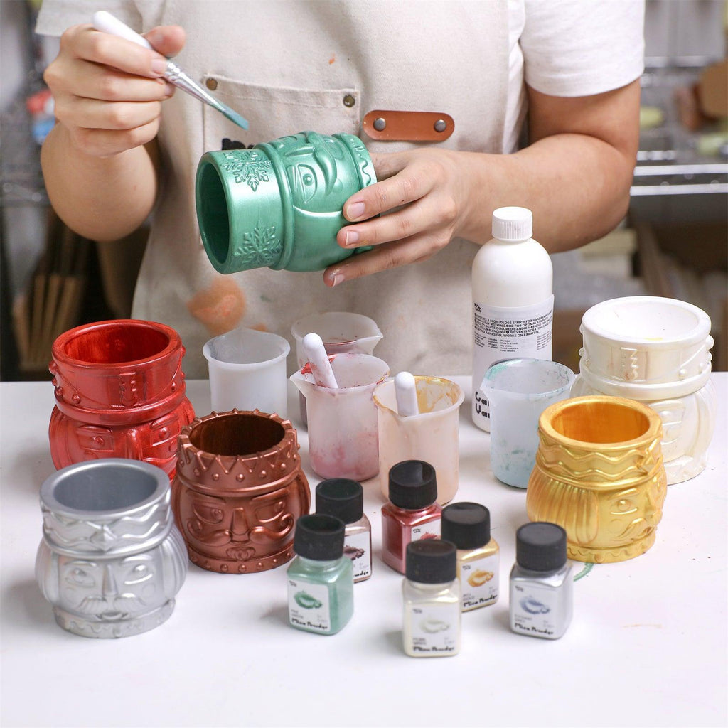 Hand-painted Christmas nutcracker jars with christmas mica powder – festive DIY setup with tools and gloss sealer -Boowan Nicole