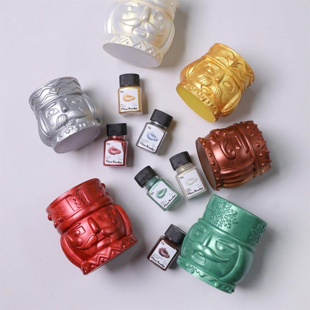 Nutcracker candle jars with mica powder in festive metallic colors - Boowan Nicole