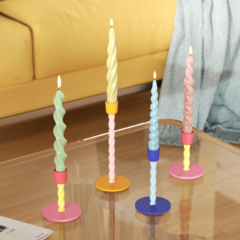 Colorful twisted candles paired with a vibrant twisted candle holder are a fun and stylish accent piece for home decor-Boowan Nicole