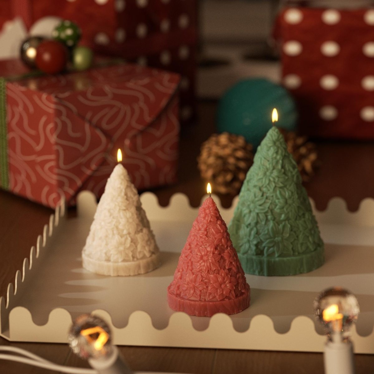 Three poinsettia-textured Christmas tree candles in festive colors, glowing amid holiday decor - Boowan Nicole