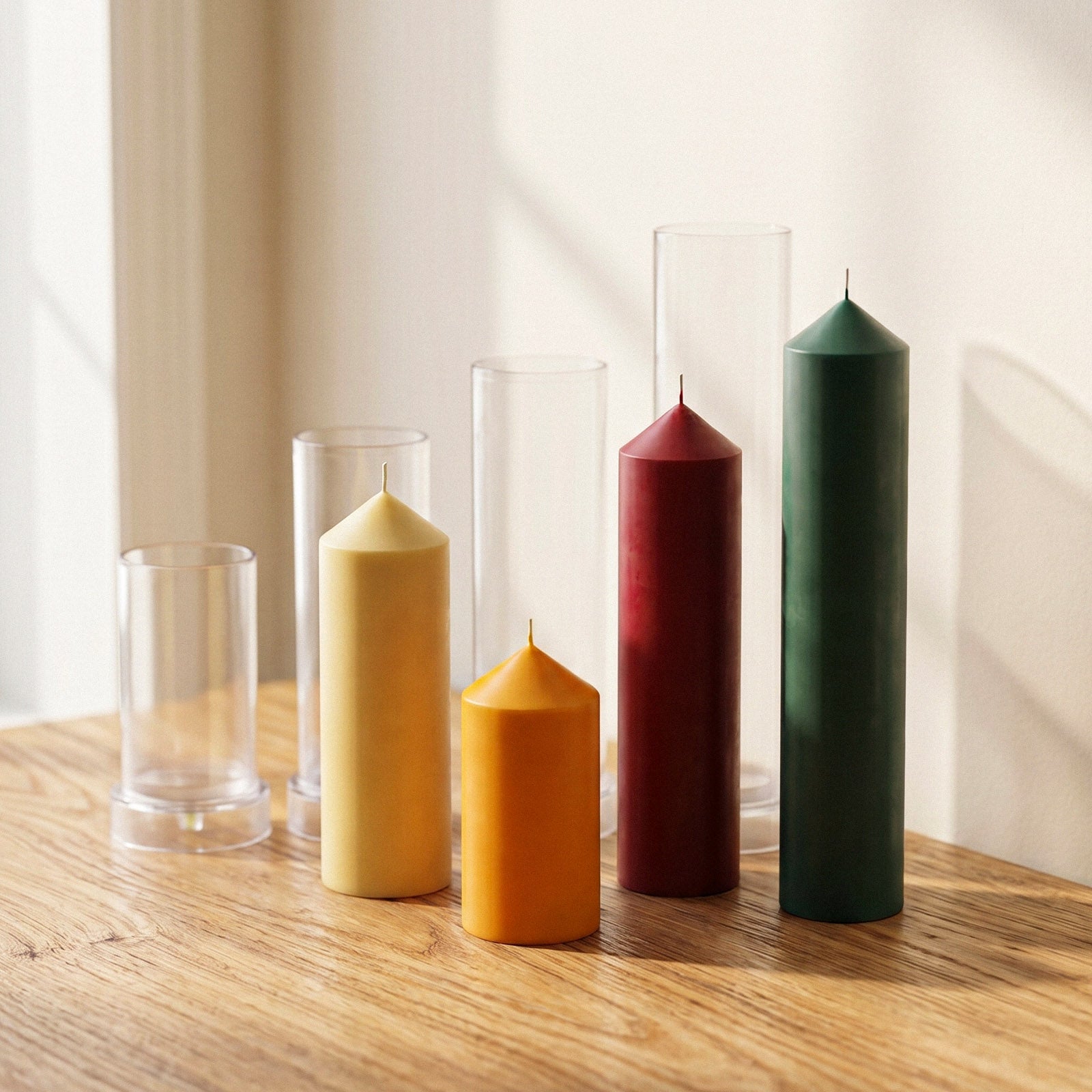 Pointed Pillar Candles and Matching Acrylic Molds on Wooden Table - Product & Mold Set Display - Boowan Nicole