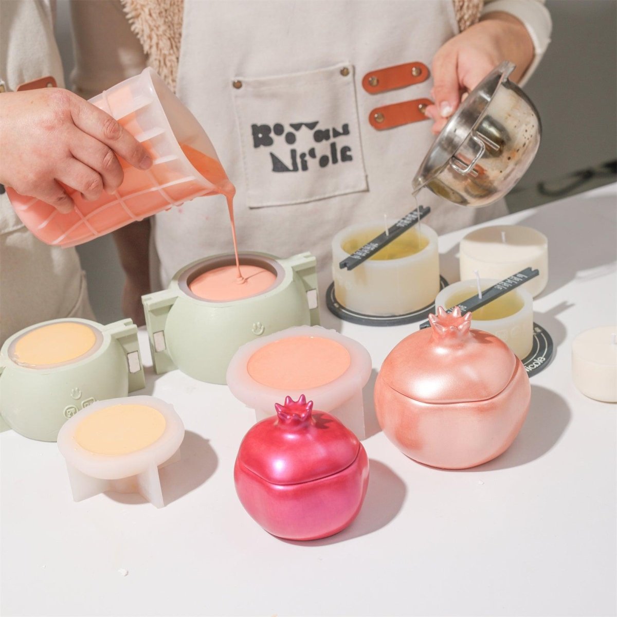 Handmade pomegranate-shaped candle jars made with silicone molds, ideal for concrete, plaster, and jesmonite candle making-Boowan Nicole