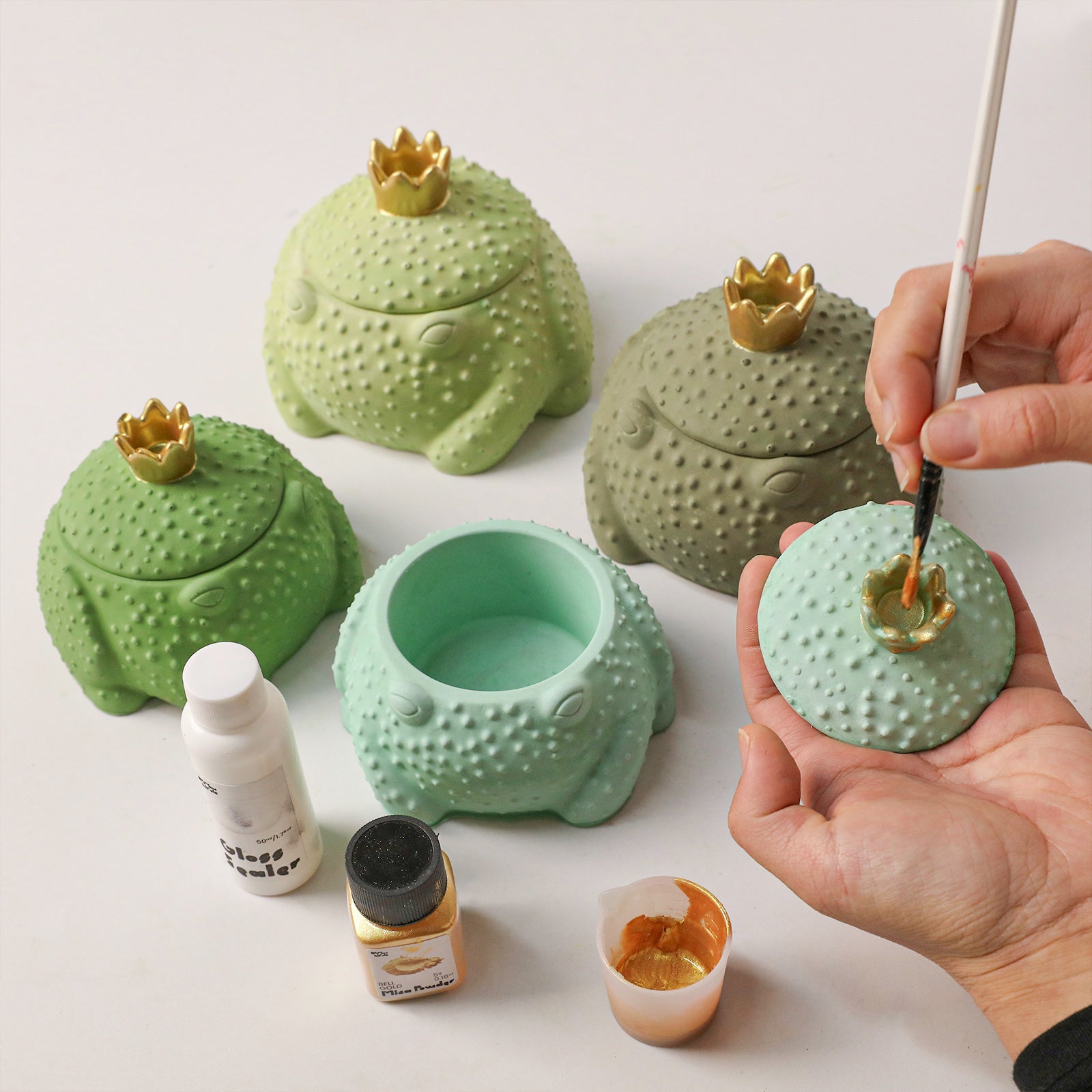 DIY Frog Prince Candle Jar Finishing - Painting Gold Crown Detail on Toad Vessels - Boowan Nicole