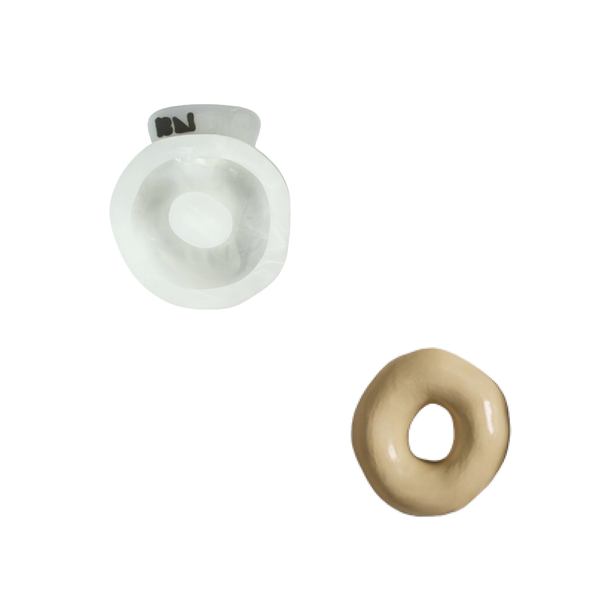 Lowercase letter o silicone mold and the matching finished soap on a white background
