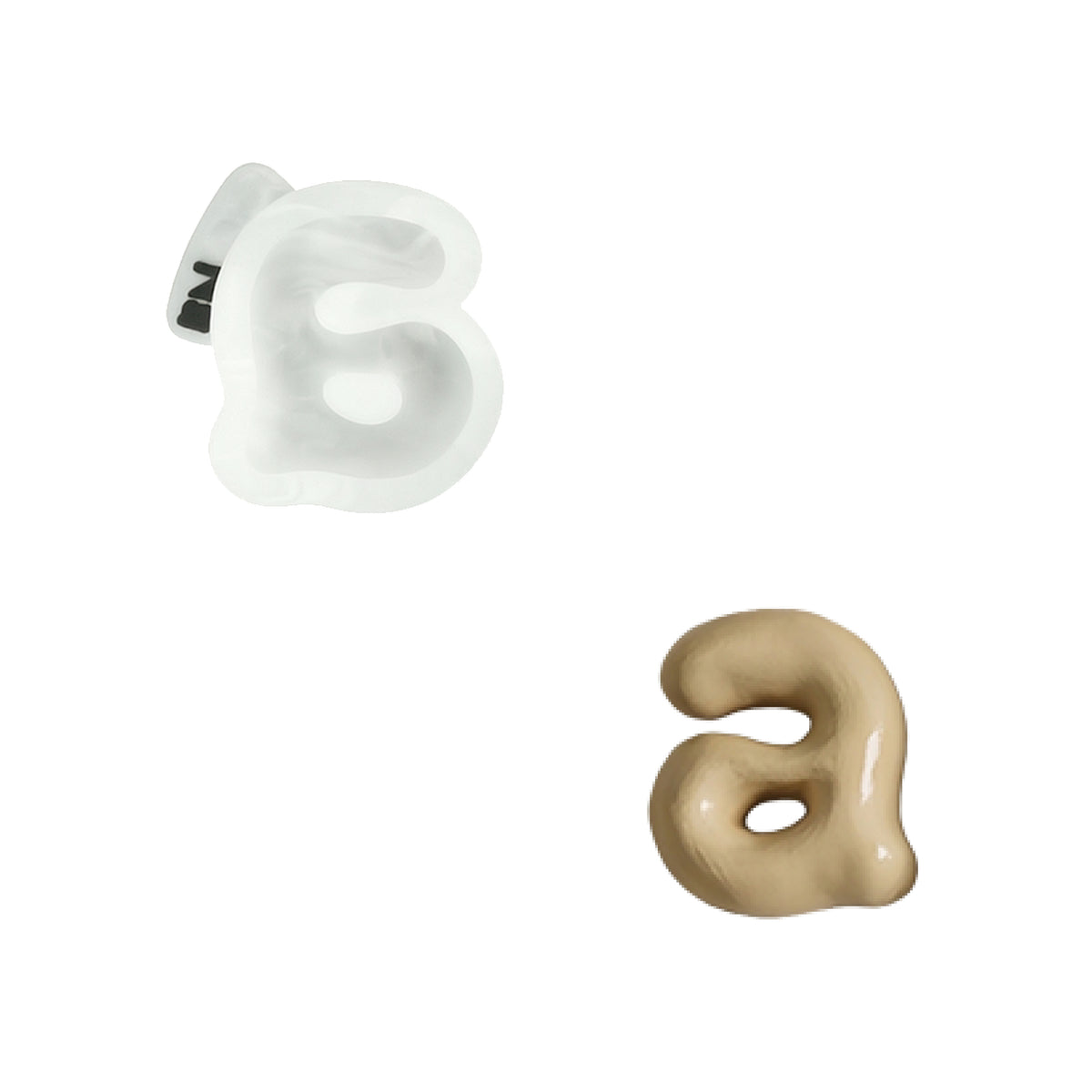 Lowercase letter a silicone mold and the matching finished soap on a white background
