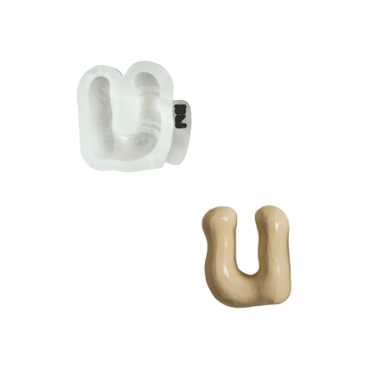 Lowercase letter u silicone mold and the matching finished soap on a white background