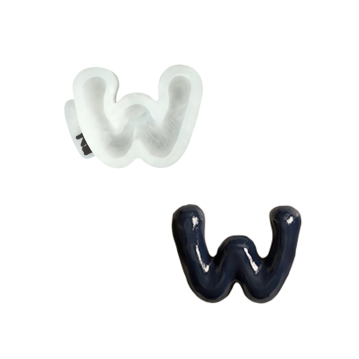 Lowercase letter w silicone mold and the matching finished soap on a white background