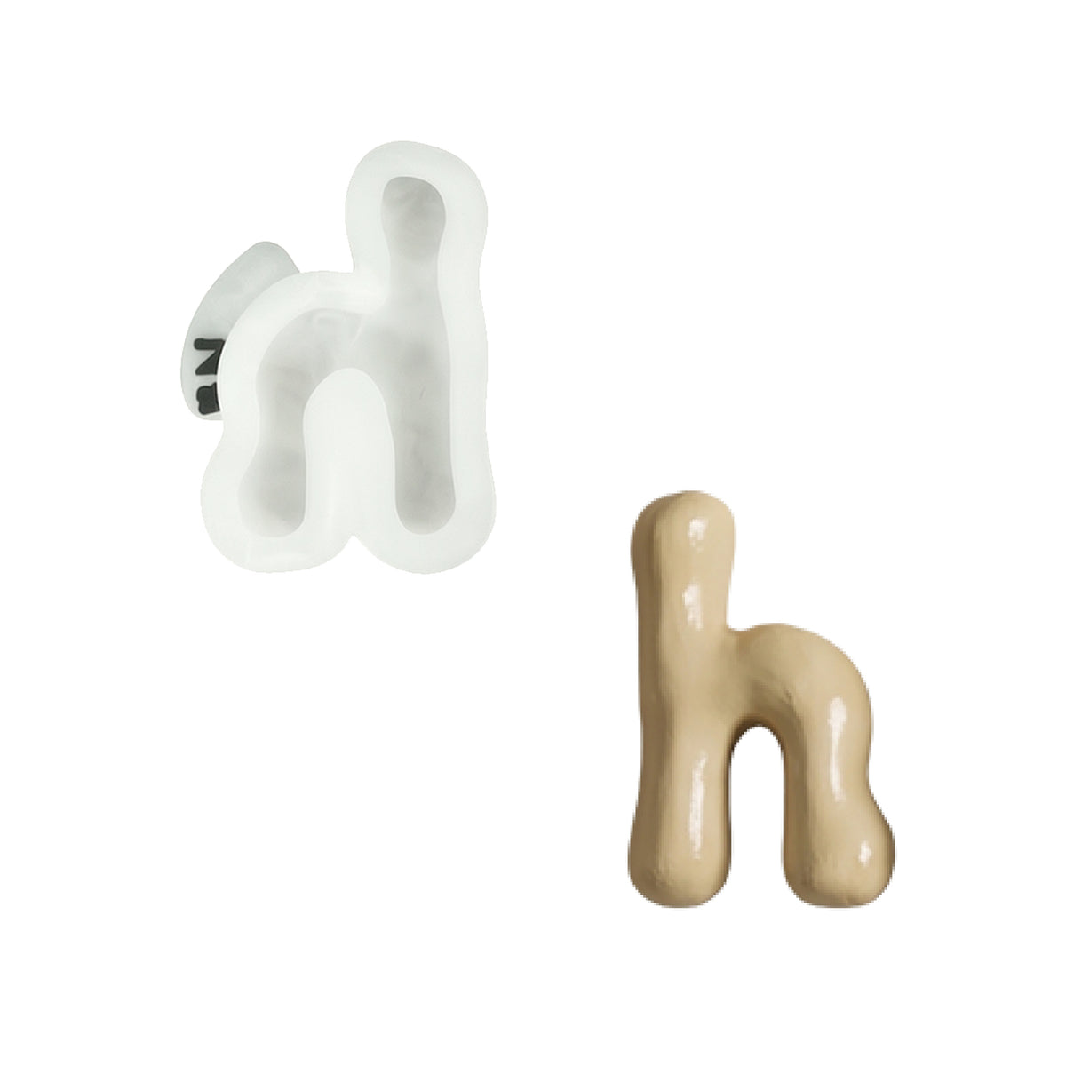 Lowercase letter h silicone mold and the matching finished soap on a white background
