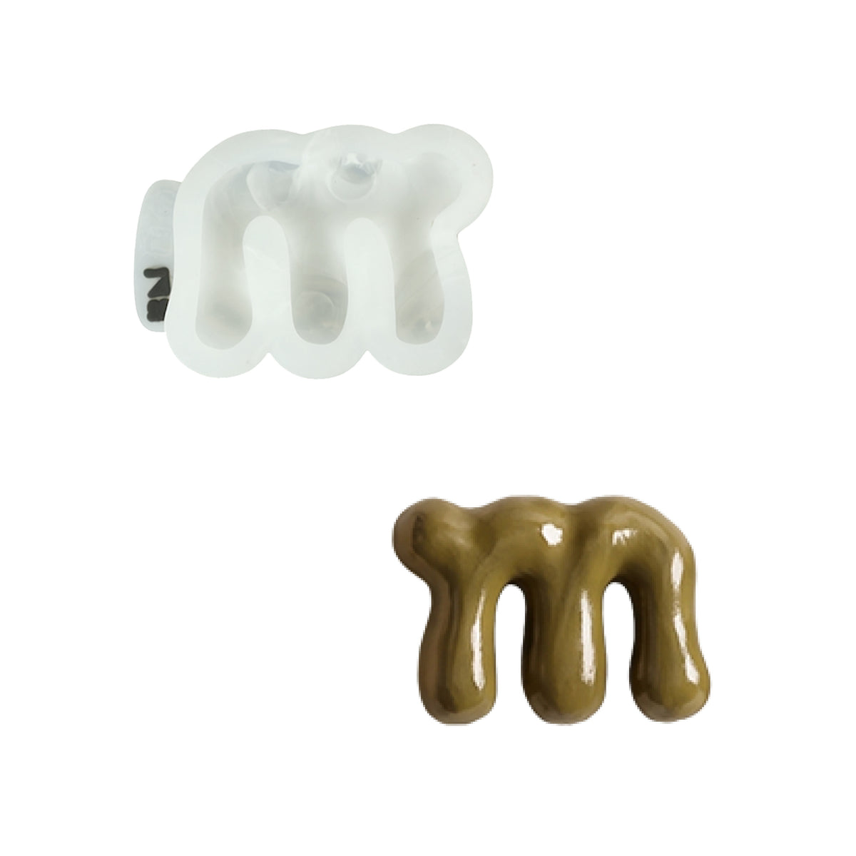Lowercase letter m shape and its white silicone mold