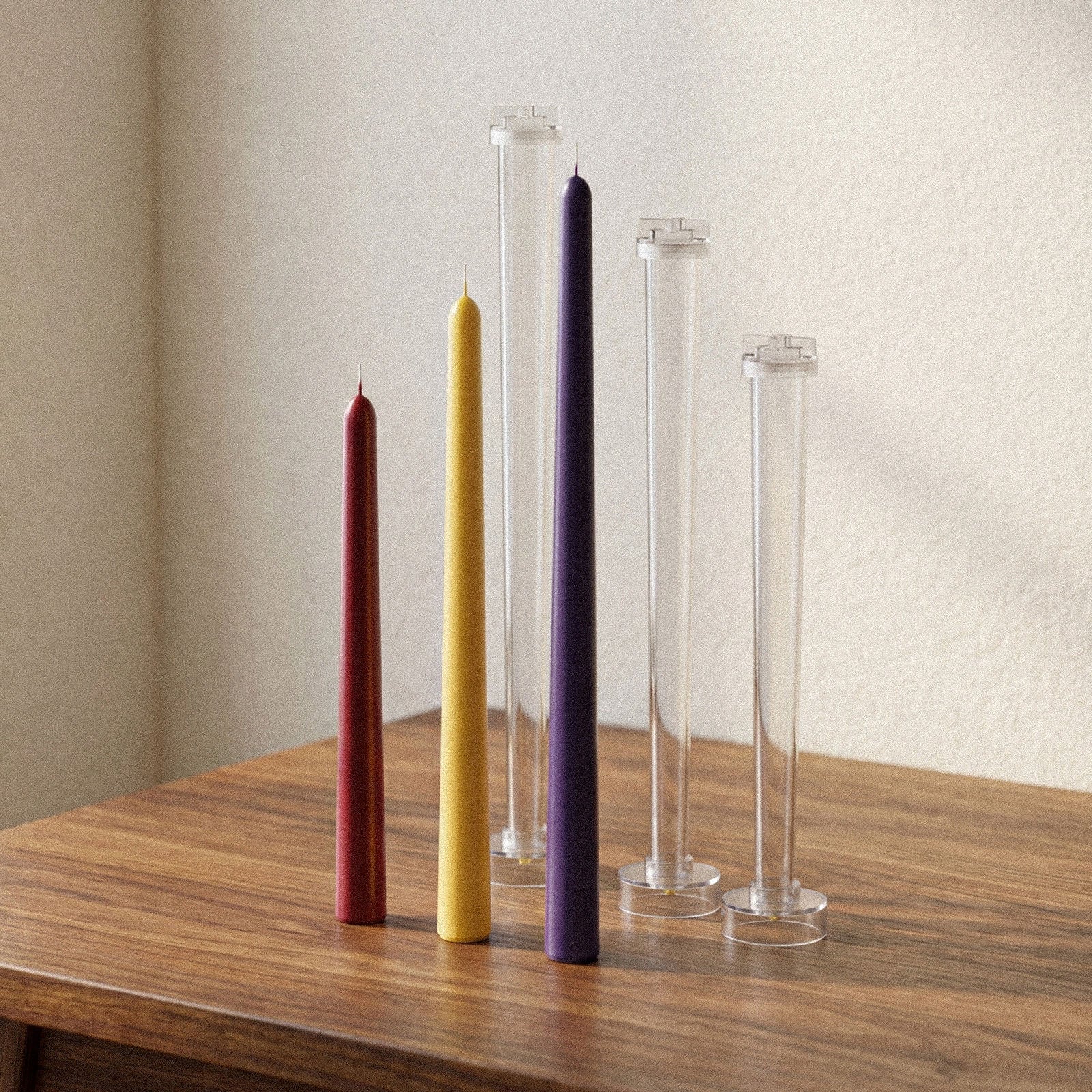 Round Top Taper Acrylic Candle Mold Collection, clear molds next to finished taper candles in three sizes on wooden table - Boowan Nicole