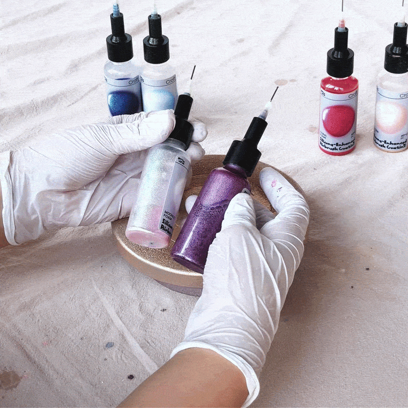 Video showing airbrushing coloring process for finished Sea Anemone Bloom candle jars - Boowan Nicole