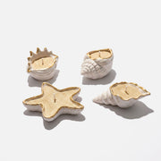 Four Styles White Ceramic Gold Trim Starfish & Conch Shaped Sand Wax Candles on Plain White Background - Boowan Nicole