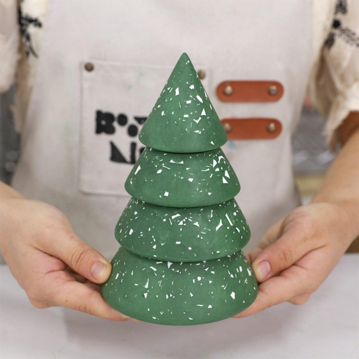 Finished stacking Christmas tree candle jar in green base color with white terrazzo chips - Boowan Nicole
