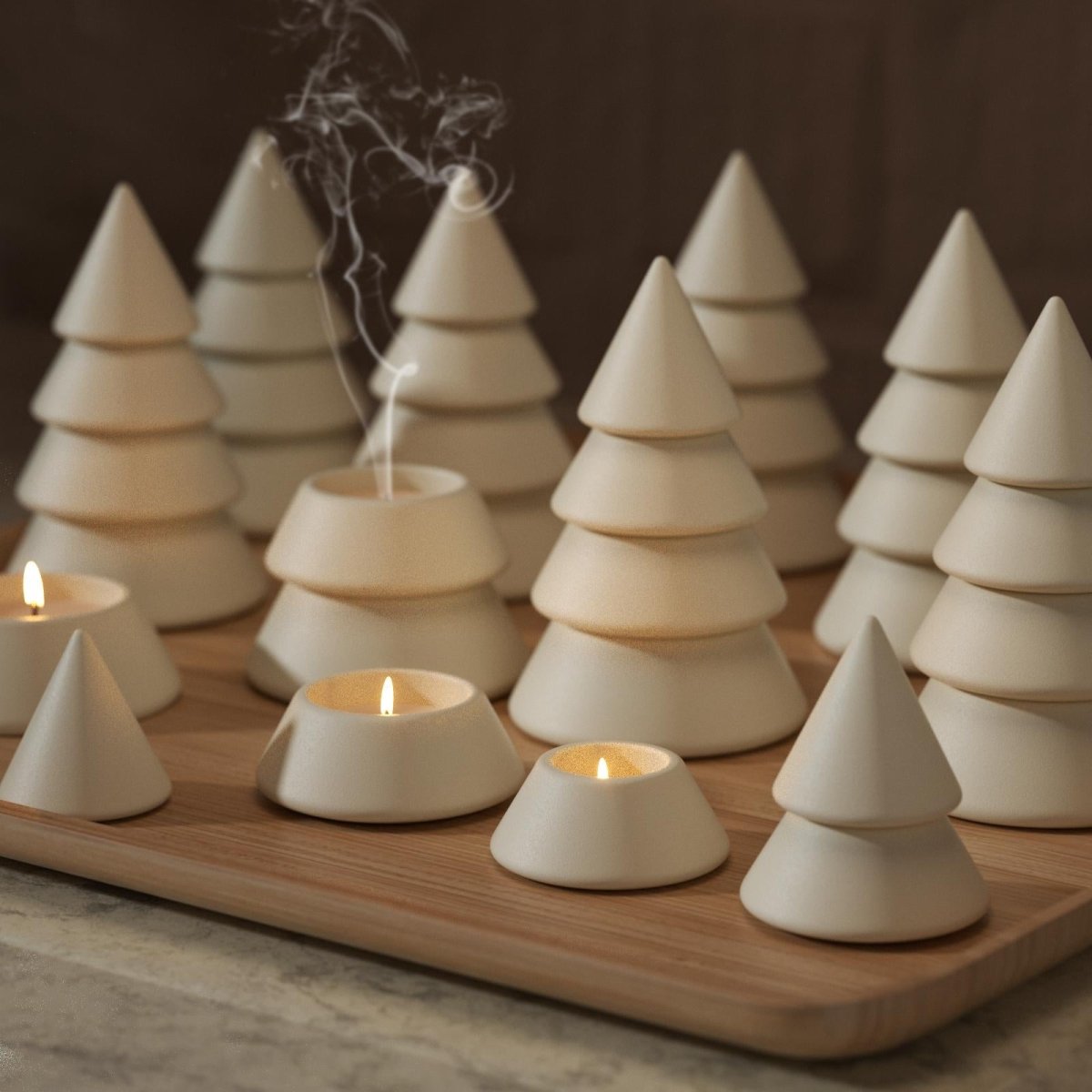 Batch-made cement-colored stacking candle jars lit to create a cozy ambient atmosphere - Boowan Nicole