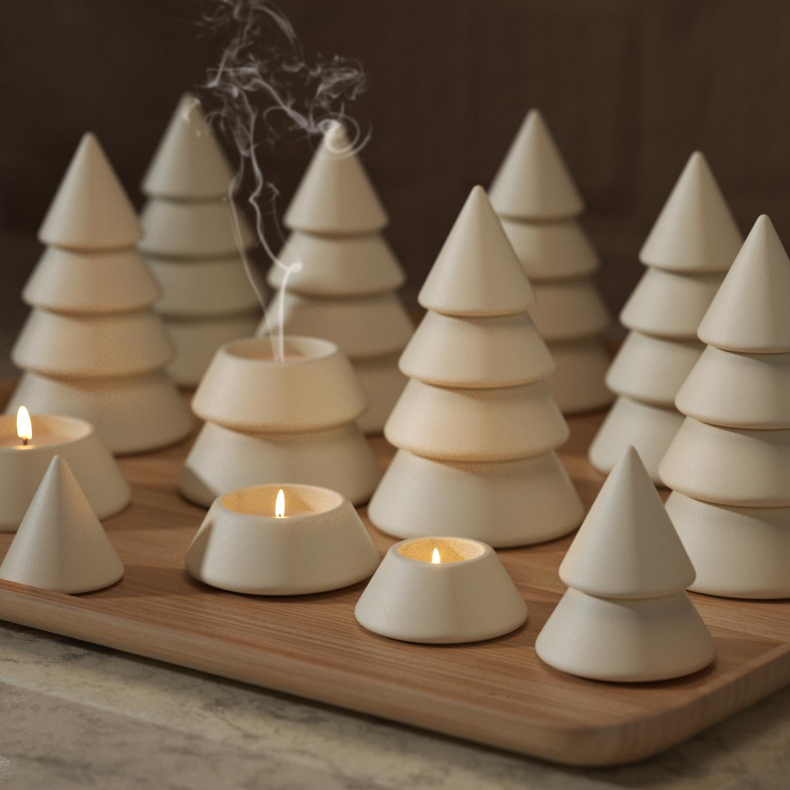 Batch-made cement-colored stacking candle jars lit to create a cozy ambient atmosphere - Boowan Nicole