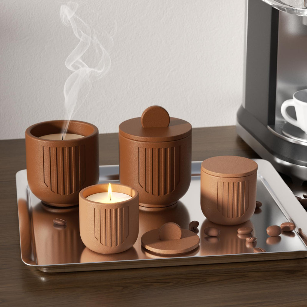 Brown geometric candle jars with lit candle and steam, styled on tray with coffee beans - Boowan Nicole