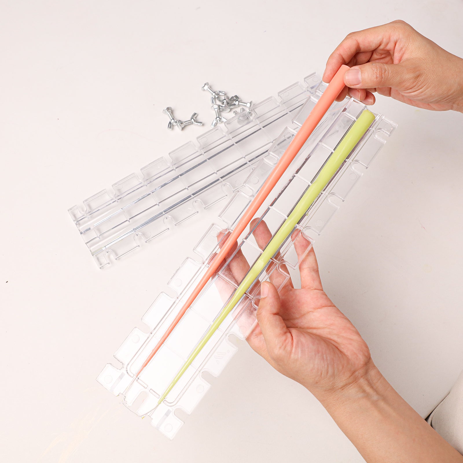Ultra Slim Taper Acrylic Candle Mold, unmolding finished slim taper candles from clear acrylic mold - Boowan Nicole