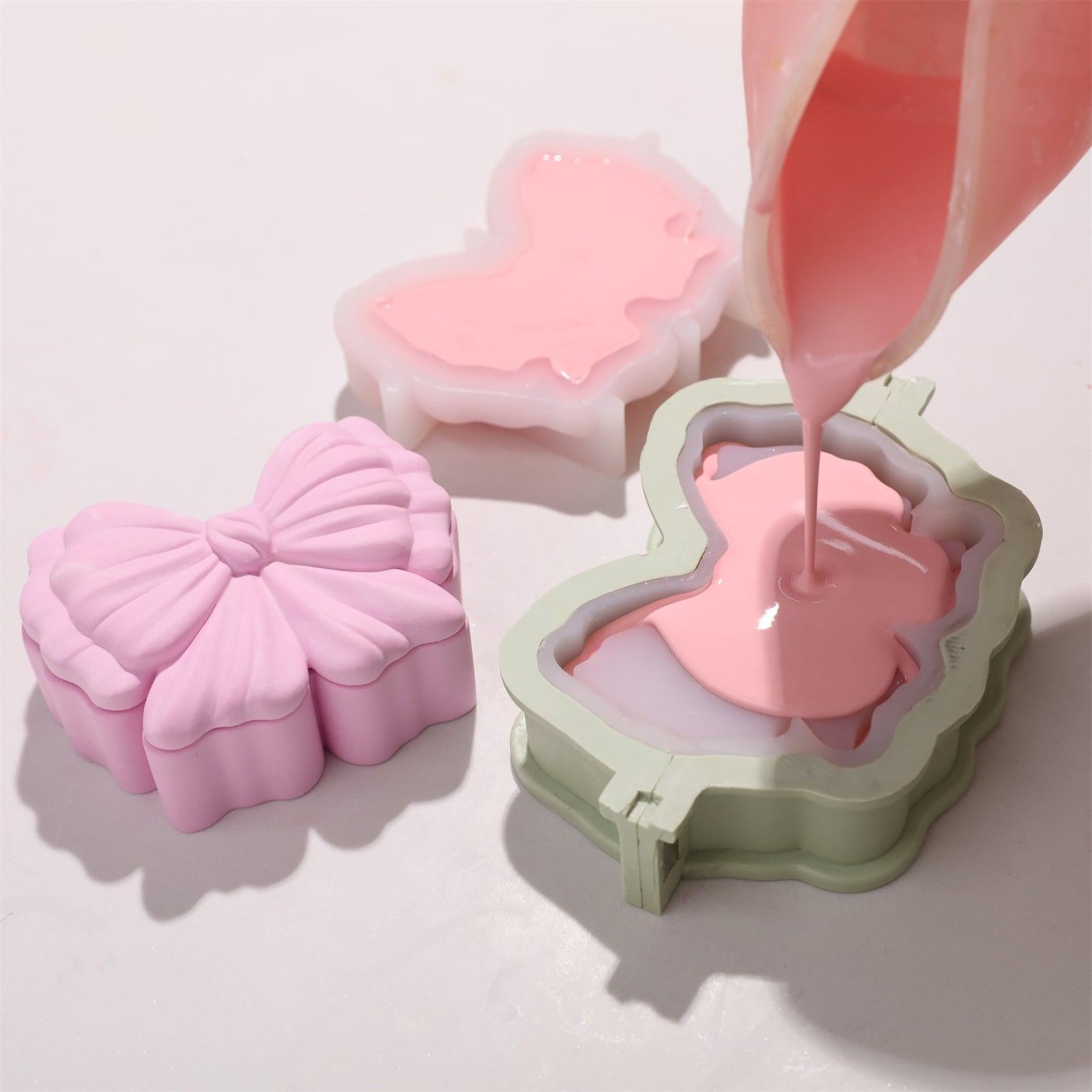 Pour pink concrete into the bow-shaped silicone mold with a support shell-Boowan Nicole