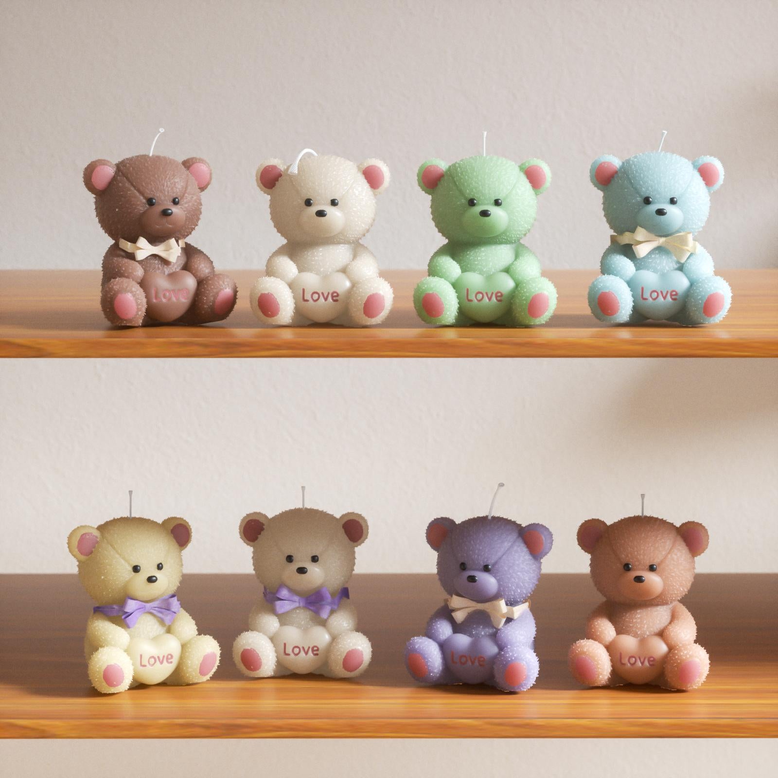 Colorful teddy bear-shaped candles with "Love" detail and ribbon, displayed on shelves - Boowan Nicole