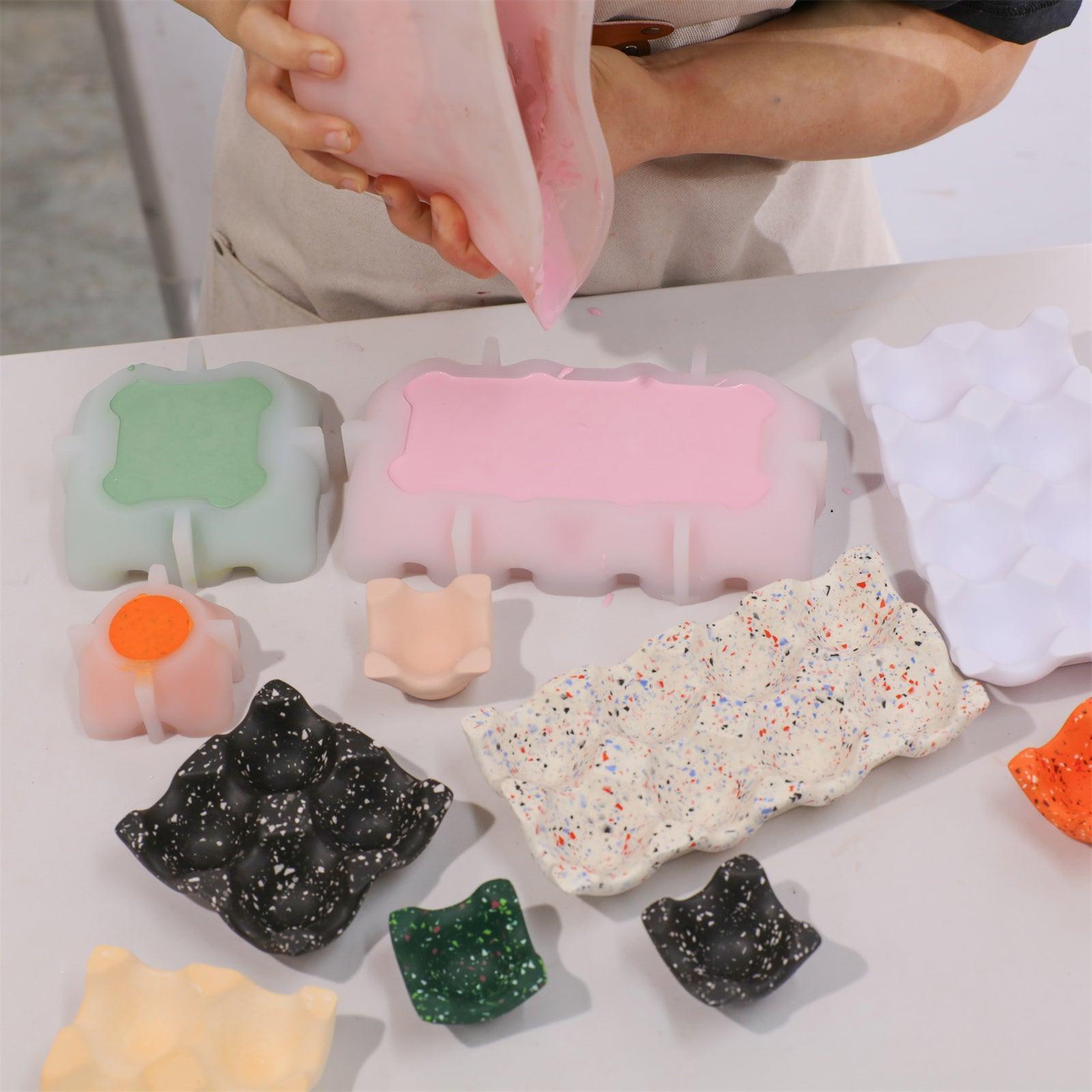 Pour the mixed Boowannite material and pigment into egg tray silicone molds of various sizes - Boowan Nicole