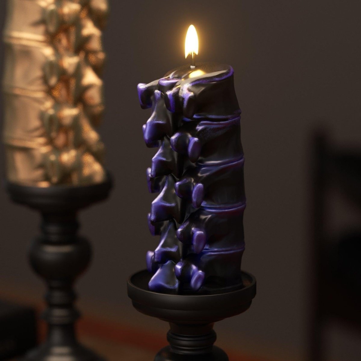 Black and purple glossy spine candle lit on a Halloween-themed stand - Boowan Nicole