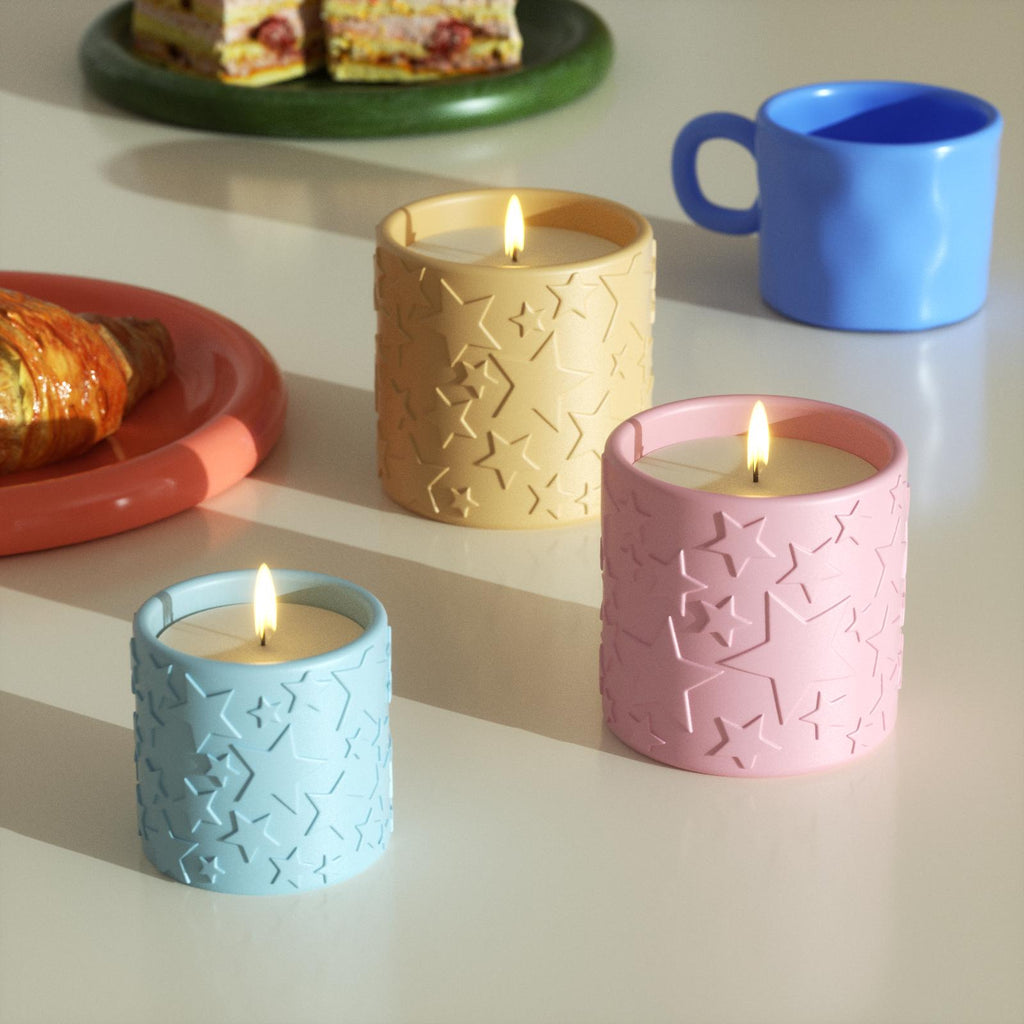Handmade star-patterned concrete candle jars in pastel colors, creating a cozy ambiance for home decor-Boowan Nicole