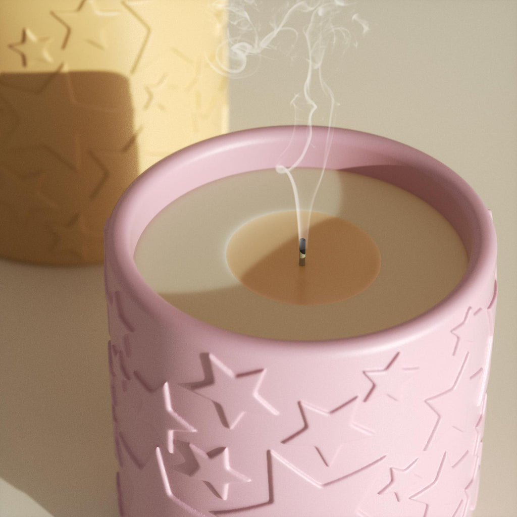 Handmade star-shaped concrete candle jar lit on dining table, emitting warm glow – cozy home decor-Boowan Nicole