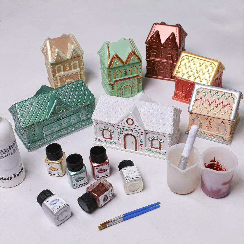 Christmas gingerbread candle jars with christmas glitter sealer varnish and hand-painting setup for festive DIY crafting - Boowan Nicole