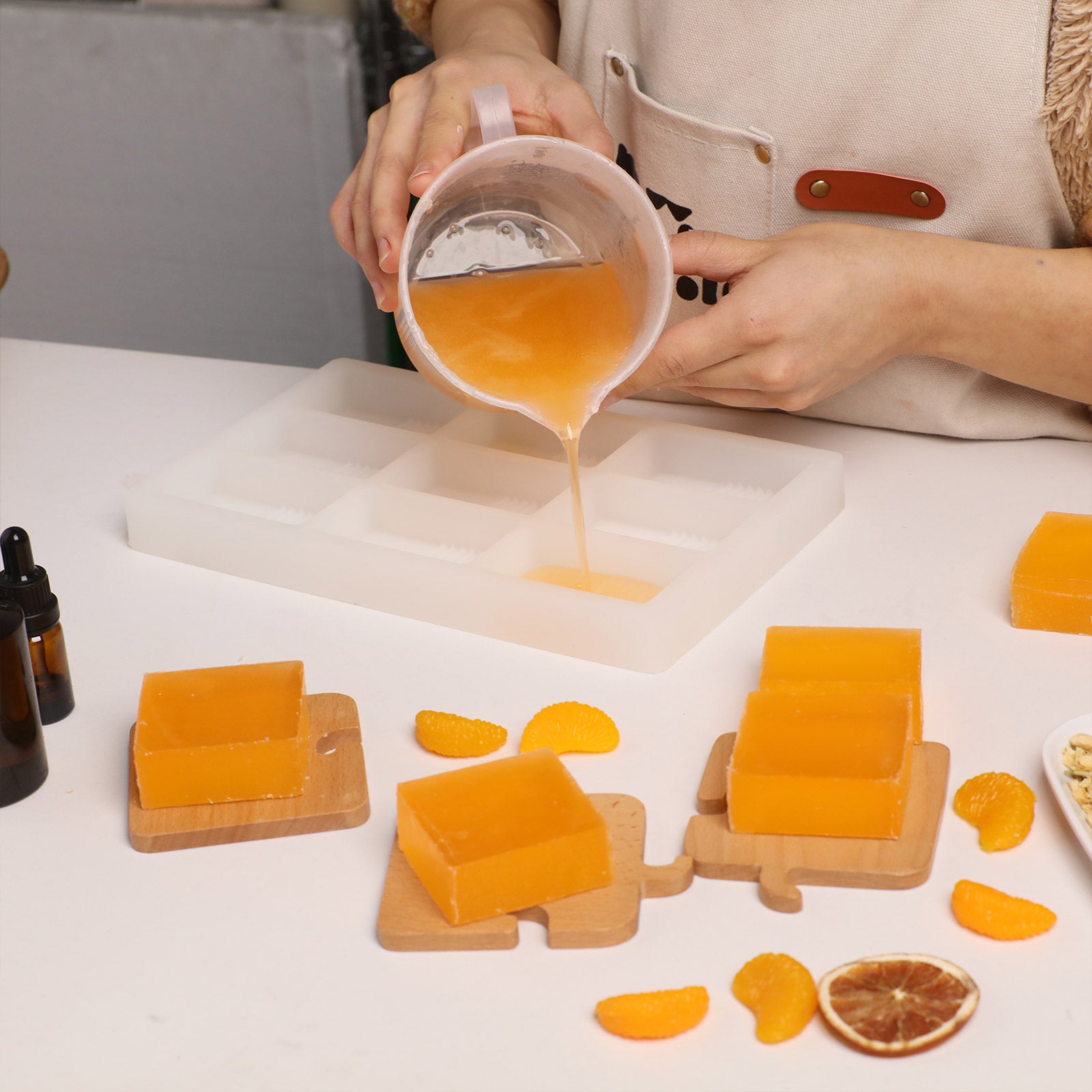 Pouring Orange Soap Base into Silicone Mold - Boowan Nicole