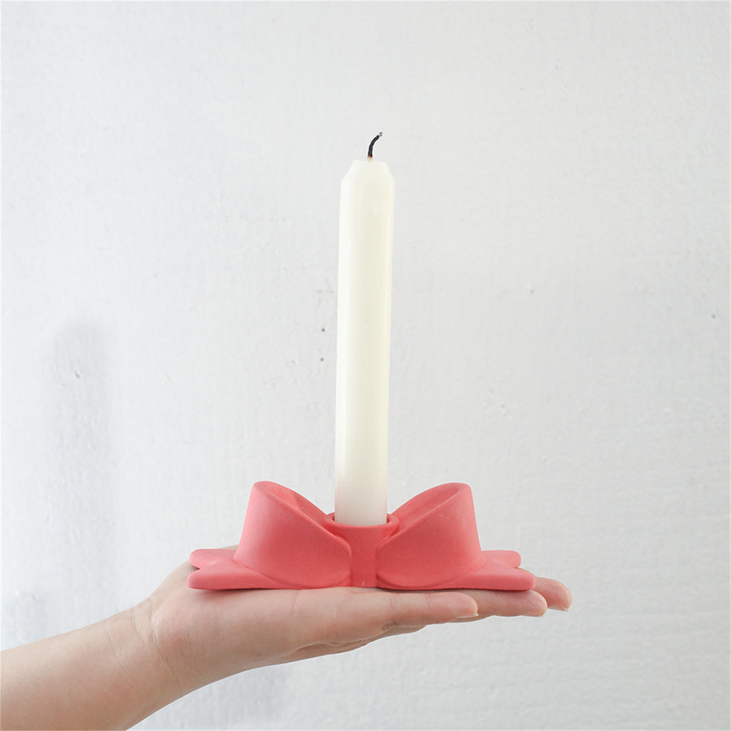 Hand-held display of the bow-shaped candle holder-Boowan Nicole