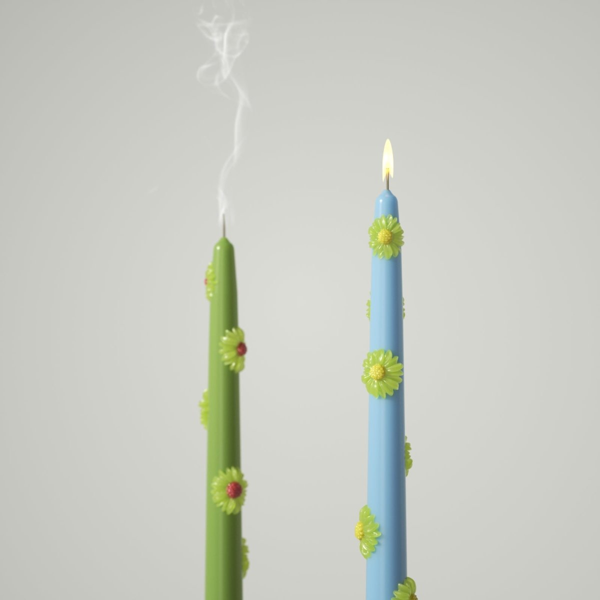 Delicate floral taper candles bring a soft, elegant glow to any setting