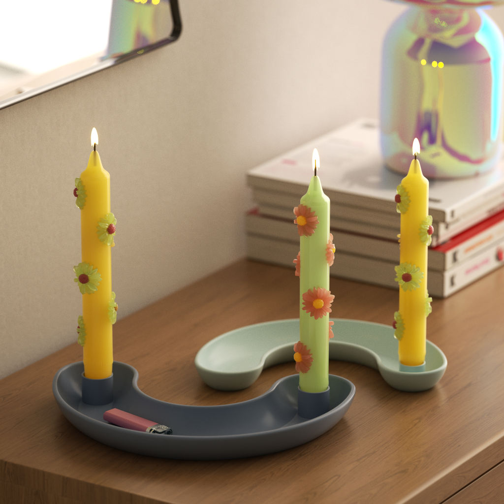 Modern curved candle holders with vibrant floral-decorated taper candles, perfect for adding a touch of elegance to any room-Boowan Nicole