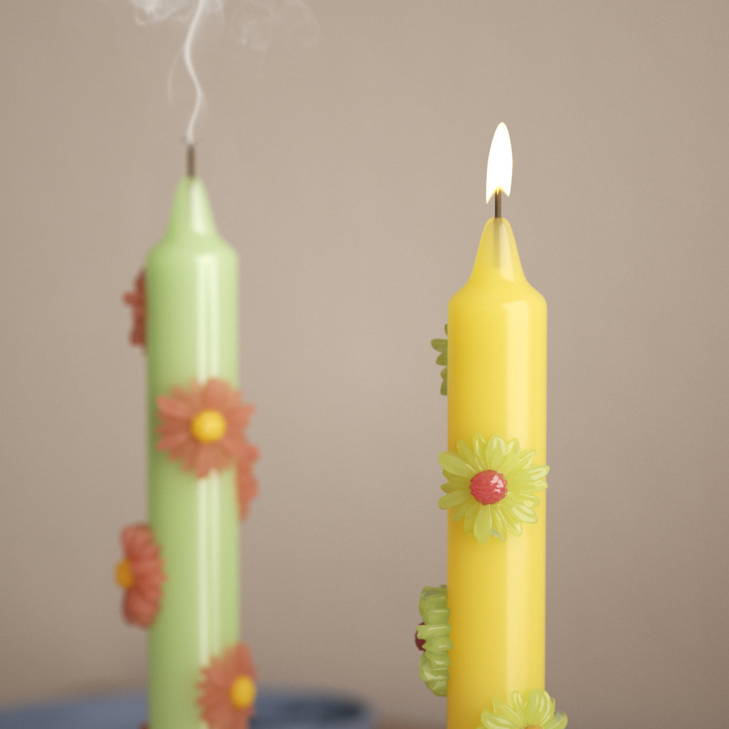 Floral-decorated taper candles in soft pastel shades, adding a fresh and elegant touch to your home decor-Boowan Nicole