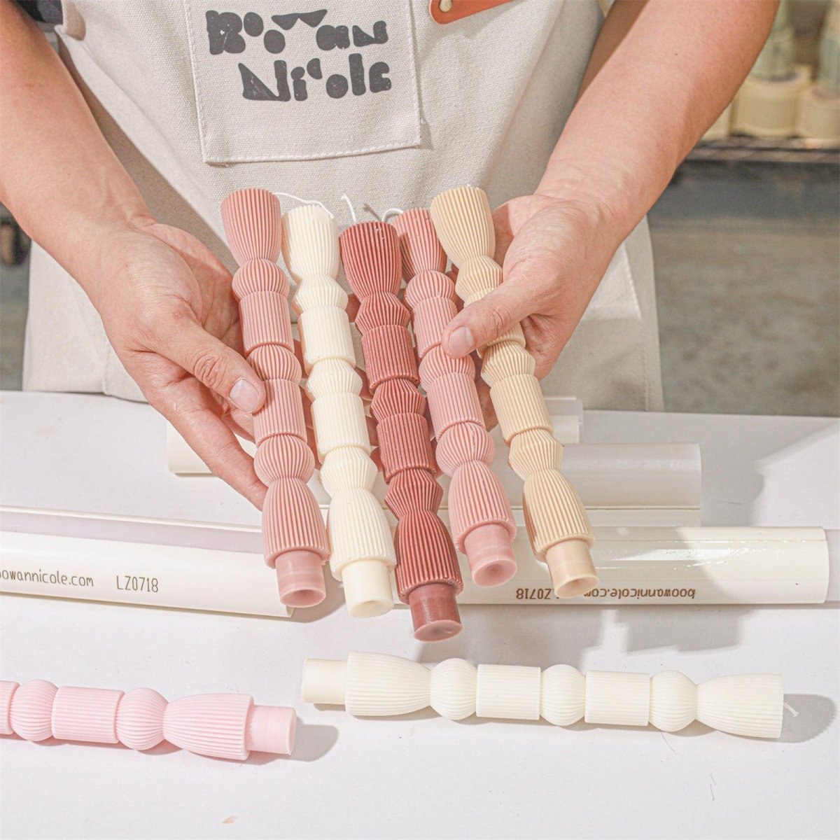 Showcasing different colors of geometric pillar candles -- Boowan Nicole