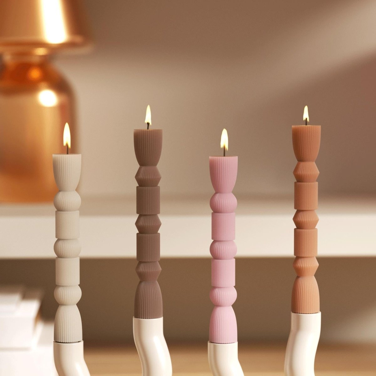 Lighting four different colors of pillar candles -- Boowan Nicole