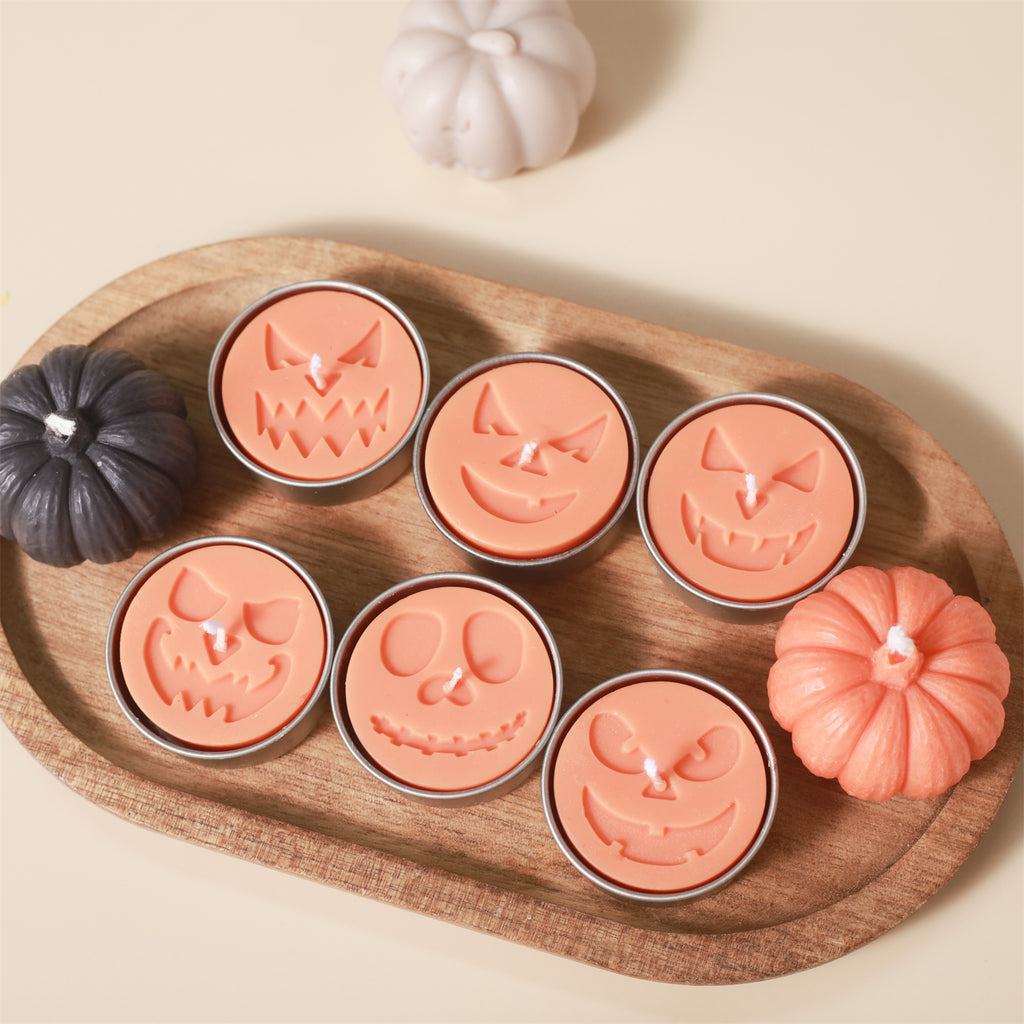 Six pumpkin-colored tea light candles in different designs - Boowan Nicole