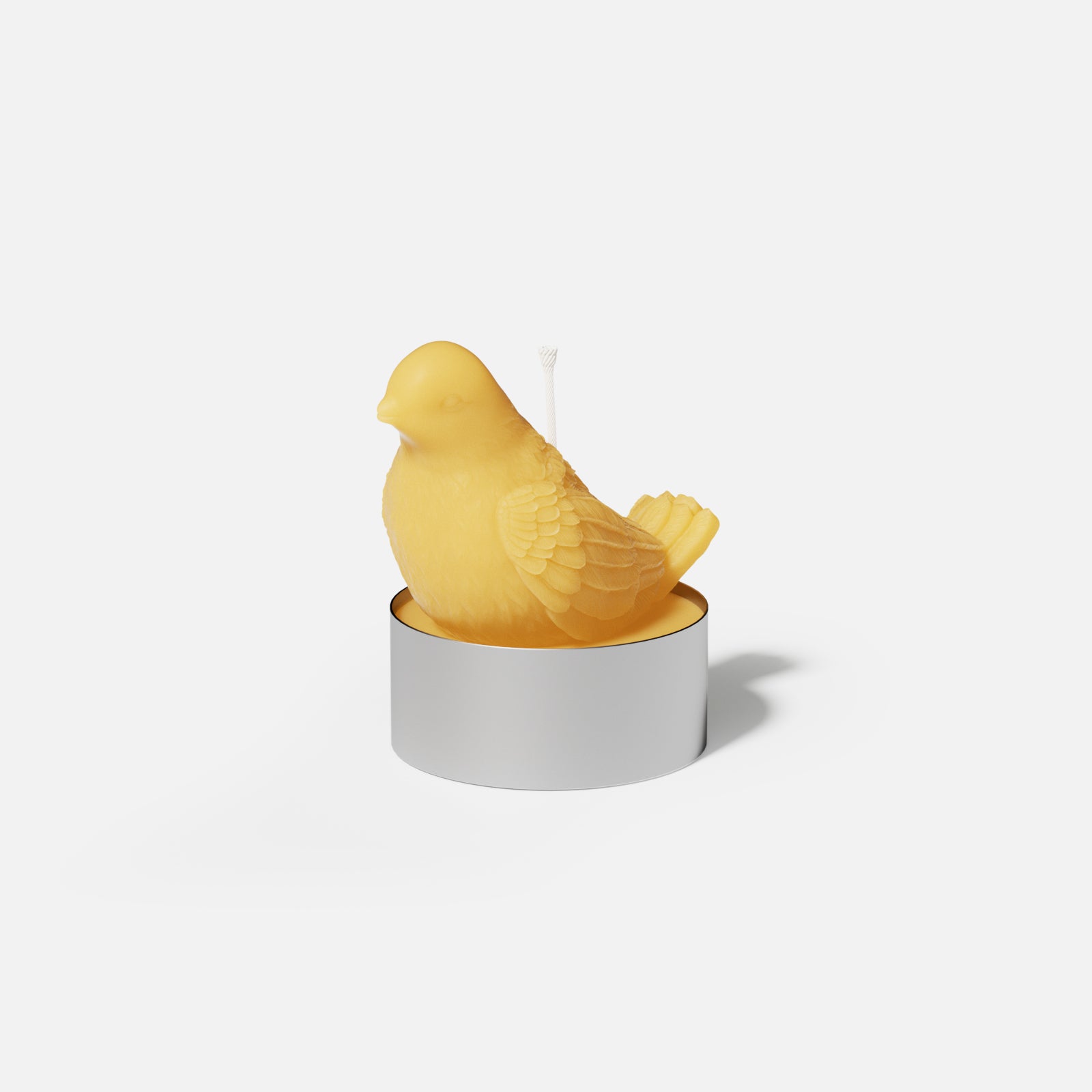 Dove-shaped tea light candle made from silicone mold, designed by Boowan Nicole.