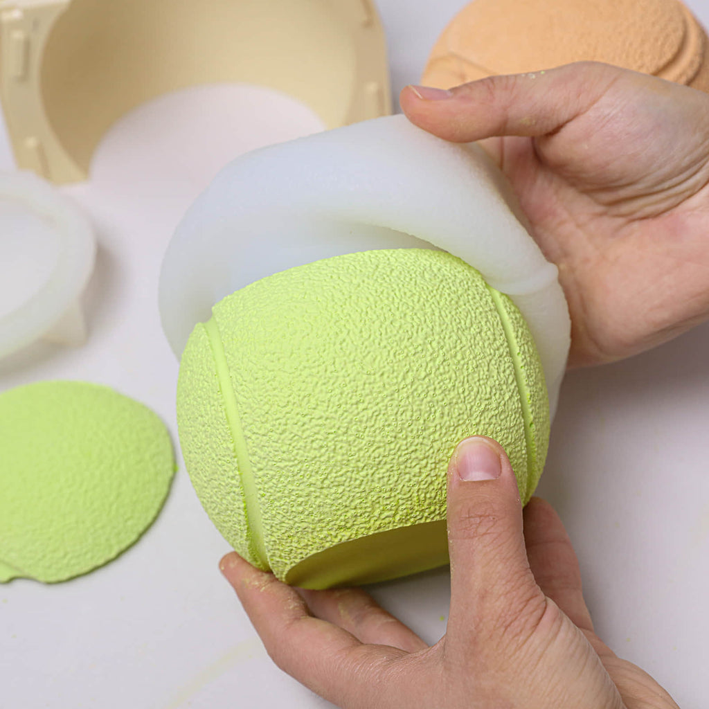 Demolding a tennis-ball candle jar from a silicone mold - Boowan Nicole