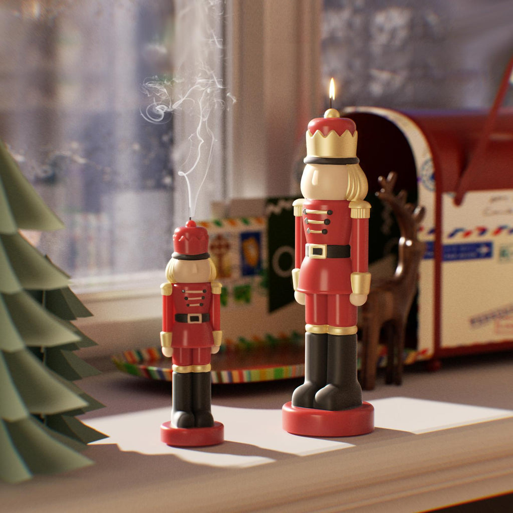 Lit and extinguished nutcracker candles on a festive windowsill—perfect for cozy holiday decor - Boowan Nicole