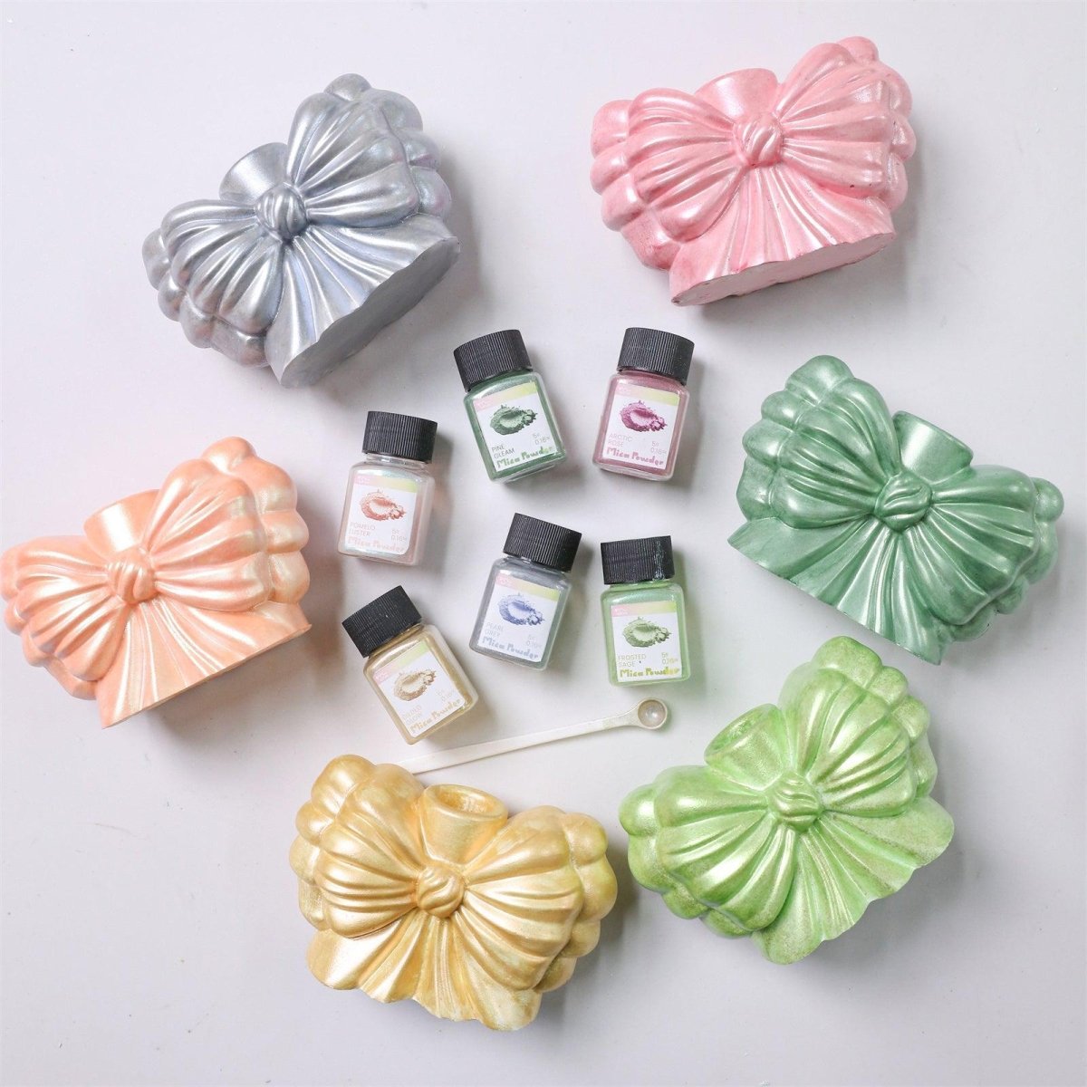 Colorful bow-shaped candle holders with mica powder pigment bottles – DIY candle making and decorative craft supplies - Boowan Nicole
