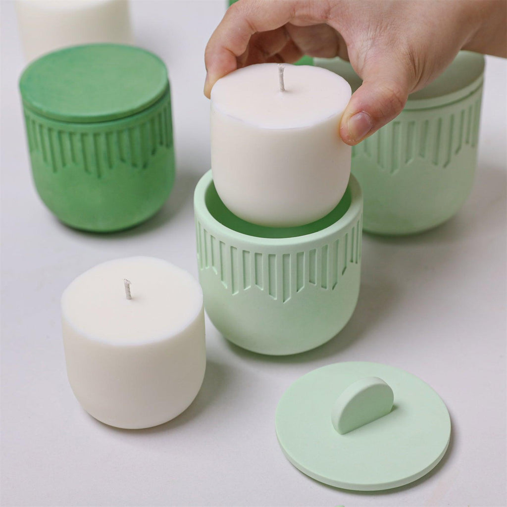 Placing a candle refill insert into a geometric concrete candle jar - Boowan Nicole