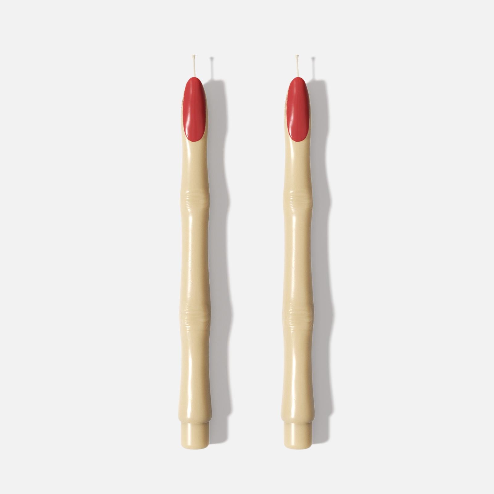 Two tapered candles shaped like witch’s fingers with red nail tips - Boowan Nicole